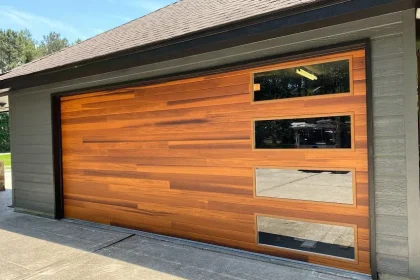 Cedar-plank-garage-door-with-windows-in-Houston